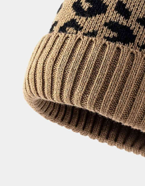 Load image into Gallery viewer, Leopard Pom-Pom Cuffed Beanie
