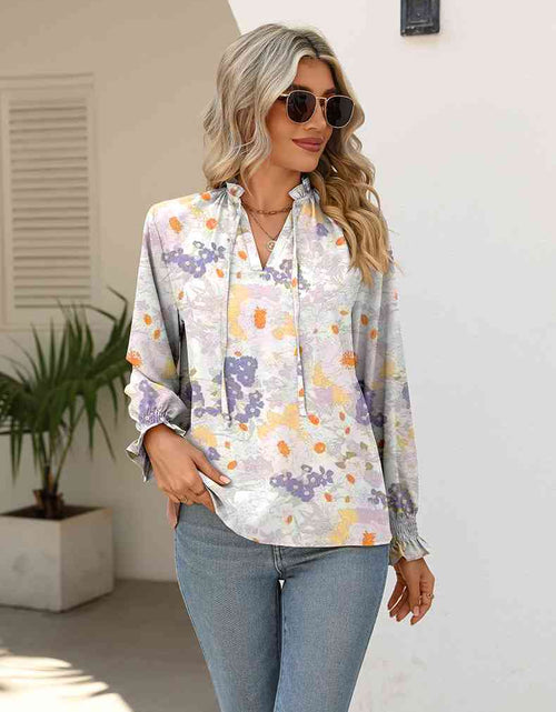 Load image into Gallery viewer, Printed Tie Neck Flounce Sleeve Blouse
