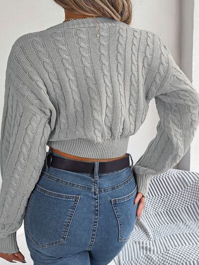 Load image into Gallery viewer, Twisted Cable-Knit V-Neck Sweater
