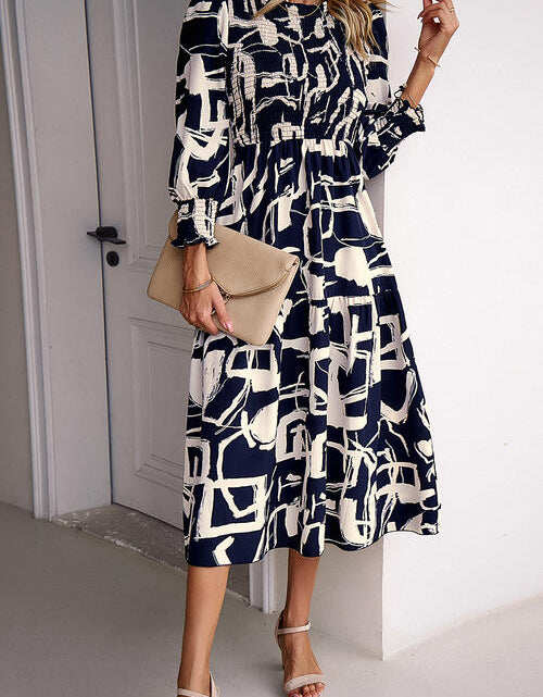 Load image into Gallery viewer, Printed Smocked Ruffle Hem Dress
