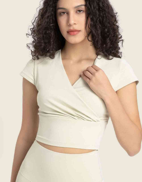 Load image into Gallery viewer, Gathered Detail Surplice Short Sleeve Sports Top
