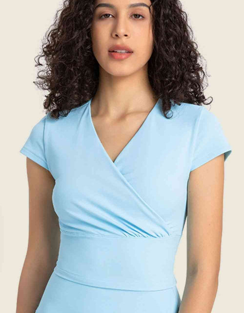 Load image into Gallery viewer, Gathered Detail Surplice Short Sleeve Sports Top
