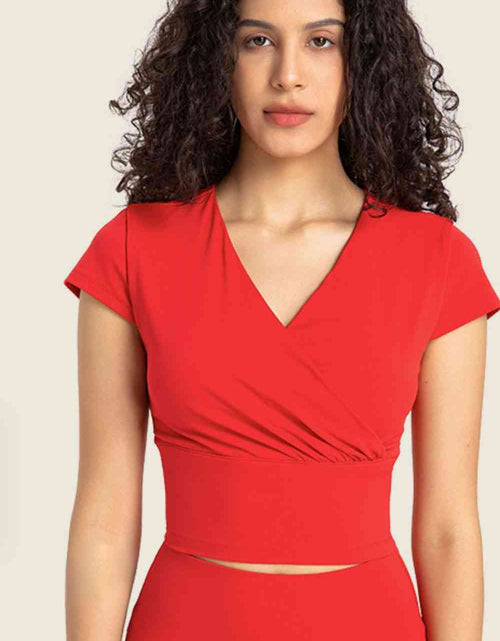 Load image into Gallery viewer, Gathered Detail Surplice Short Sleeve Sports Top
