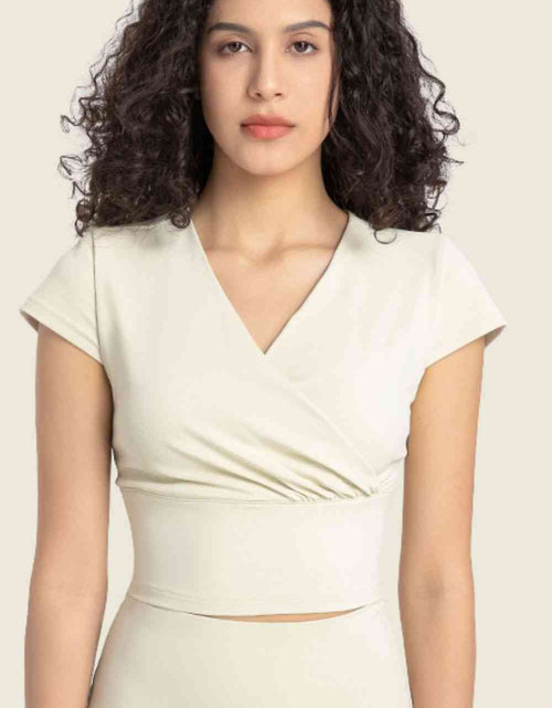 Load image into Gallery viewer, Gathered Detail Surplice Short Sleeve Sports Top
