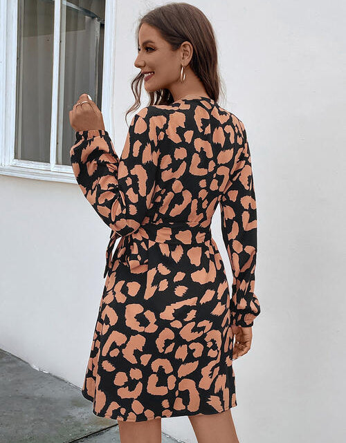 Load image into Gallery viewer, Printed Surplice Long Sleeve Dress
