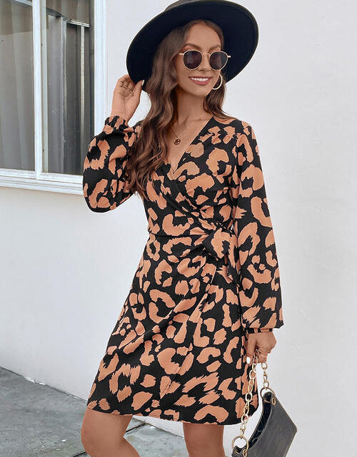 Load image into Gallery viewer, Printed Surplice Long Sleeve Dress
