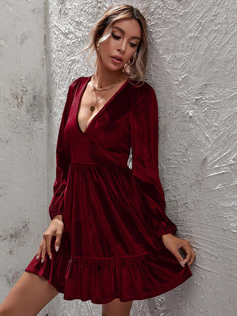 Load image into Gallery viewer, Plunge Long Sleeve Ruffle Hem Dress
