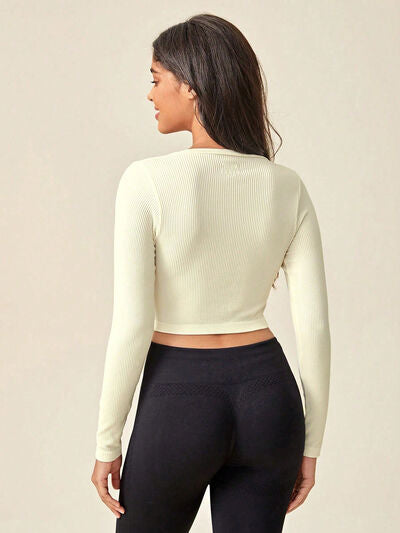 Load image into Gallery viewer, Ribbed Notched Long Sleeve Cropped Active Top
