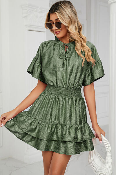 Load image into Gallery viewer, Smocked Tie Neck Flounce Sleeve Dress
