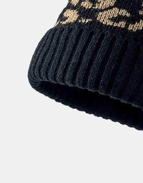 Load image into Gallery viewer, Leopard Pom-Pom Cuffed Beanie
